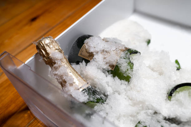 Champagne bottles chilling in crushed ice